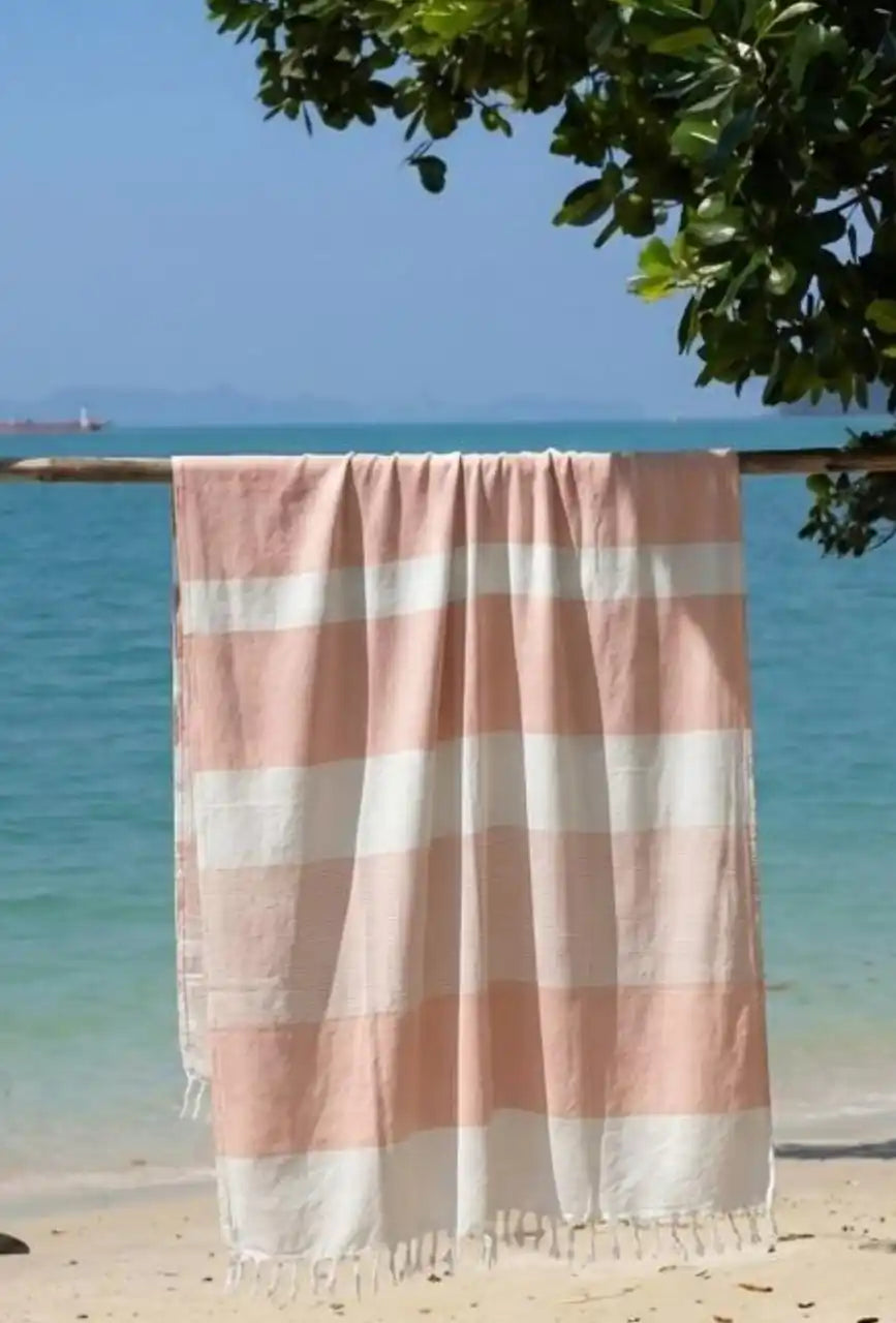 Thin_bamboo_bath_towel_peach_melba_hanged